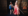 Two party guests walk together
